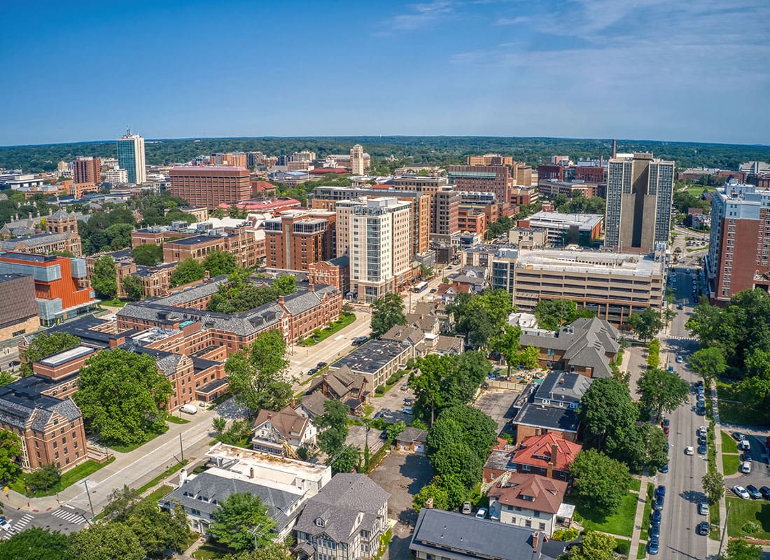 Contact - Aerial View of Downtown Ann Arbor Michigan Commercial Buildings on a Sunny Summer Day